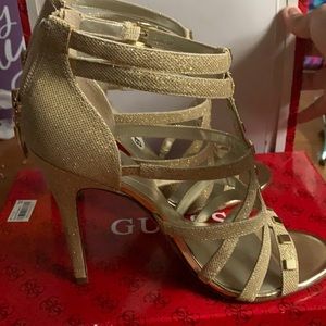 New and old fashioned gold heels. Worn once.